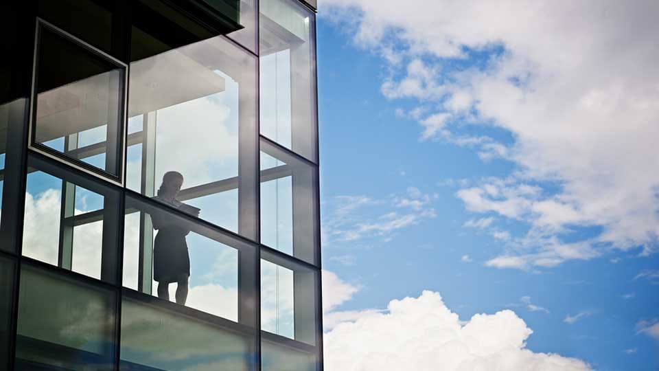 Businesswoman holding digital table